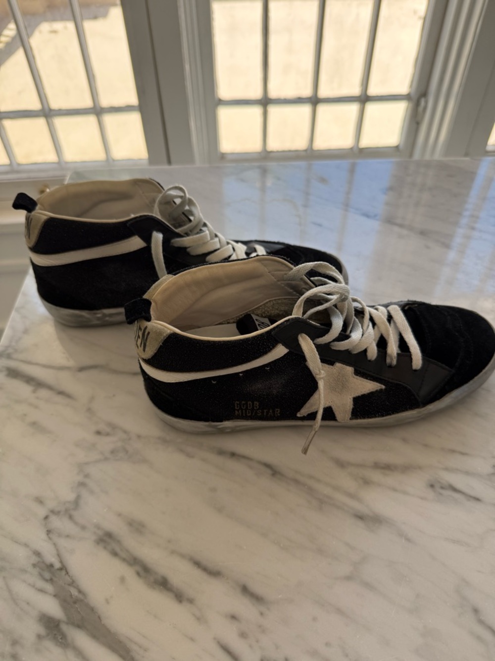 Golden Goose Black and White Midstar High-Top Sneakers